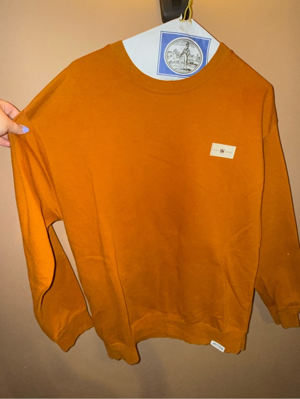 Crewneck Jim Beam Sweater with βBasil Haydenβ Logo in Rust Orange